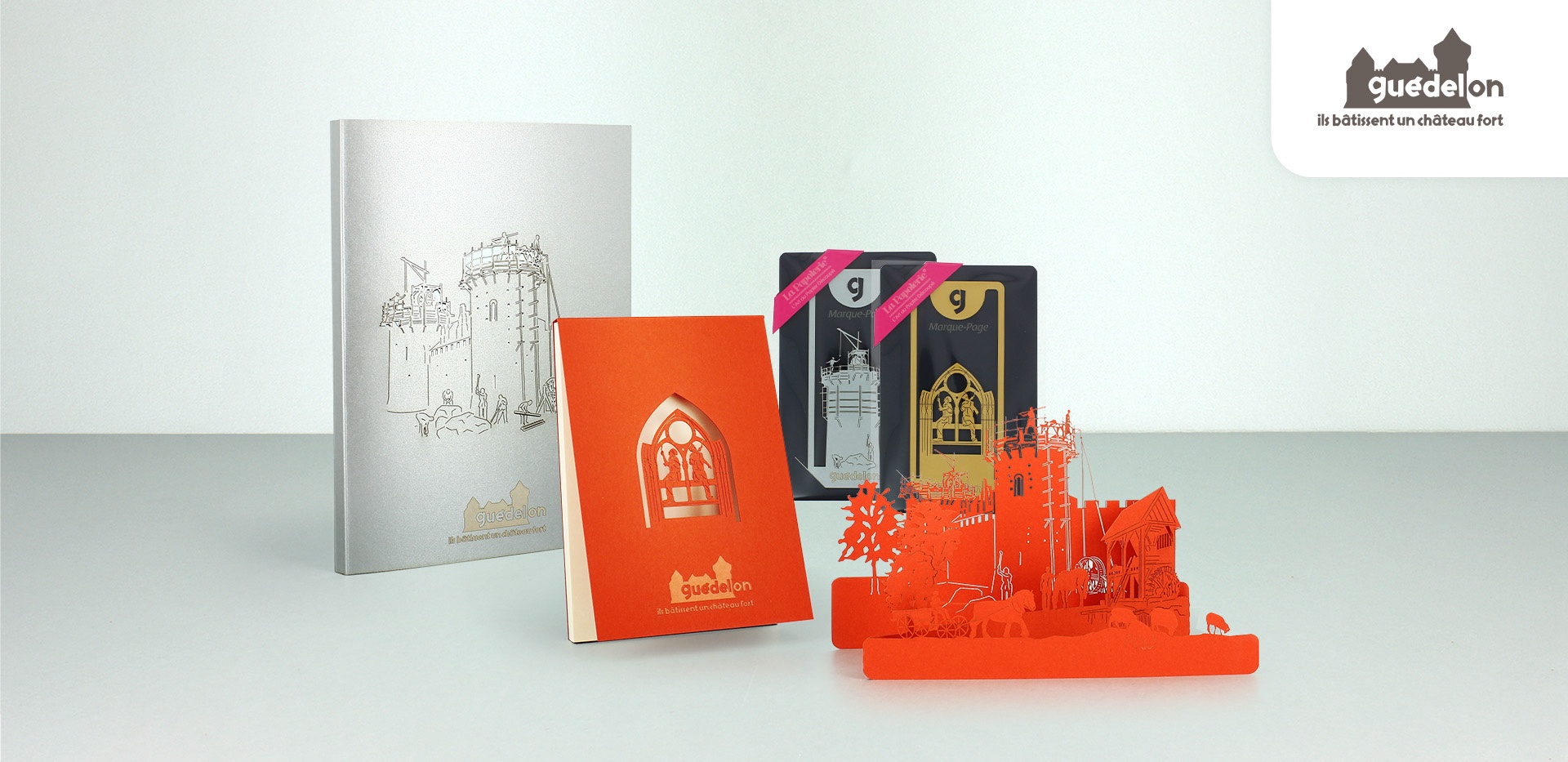 Stationery assortment with A6 notepad, A5 notebook, bookmarks and cityscape in laser-cut for Guedelon castle